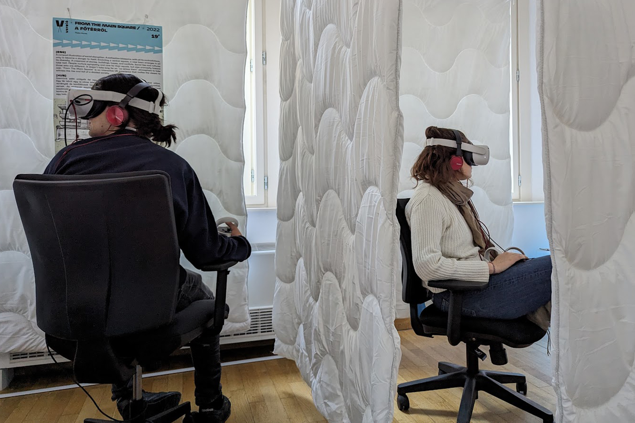 man in a VR headset on her head balancing with a stick in her hands
